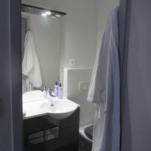 Koupelna v ubytování Hotel Régina