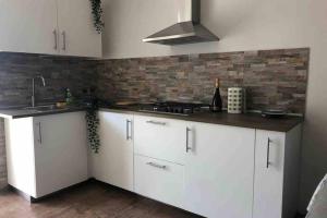 A kitchen or kitchenette at Nicole Maison