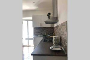 A kitchen or kitchenette at Nicole Maison
