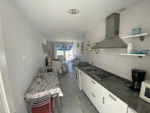 Kuchyňa alebo kuchynka v ubytovaní Arco Urta + 9 fotografií