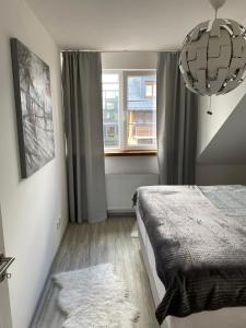 Llit o llits en una habitació de Deluxe apartmán Liščí kopec
