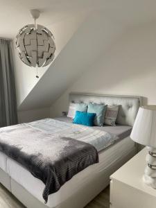Posteľ alebo postele v izbe v ubytovaní Deluxe apartmán Liščí kopec