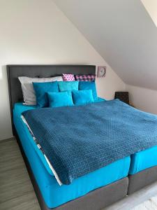 Posteľ alebo postele v izbe v ubytovaní Deluxe apartmán Liščí kopec
