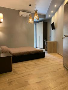 TV a/nebo společenská místnost v ubytování MARCONI 2 rooms