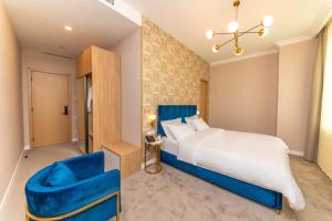 Postel nebo postele na pokoji v ubytování Newport Hotel Kutaisi