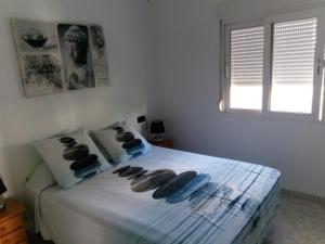 Cama o camas de una habitación en Residencial Playa Flamenca