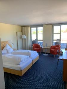 Postel nebo postele na pokoji v ubytování Hotel Evviva + 16 fotografií