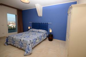 A bed or beds in a room at Agriturismo Villa Adimari