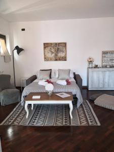 A bed or beds in a room at Perugino Apartments
