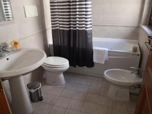 A bathroom at Perugino Apartments