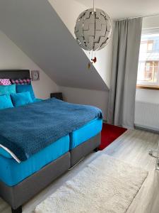 Posteľ alebo postele v izbe v ubytovaní Deluxe apartmán Liščí kopec