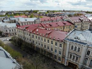 
a large building with many windows on top of it at Central Apartments Smolensk in Smolensk
