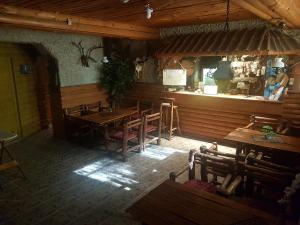 an overhead view of a restaurant with wooden tables at Hostel P33 in Tallinn