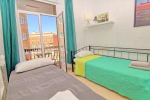Postel nebo postele na pokoji v ubytování Balcony & Room Malaga centro