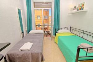 Postel nebo postele na pokoji v ubytování Balcony & Room Malaga centro