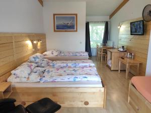 Postel nebo postele na pokoji v ubytování Max Motel