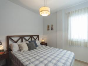 Posteľ alebo postele v izbe v ubytovaní Lets Holidays Centric apartment with parking