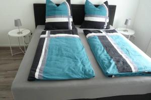 Postel nebo postele na pokoji v ubytování Ferienwohnung Schwarzwaldrand