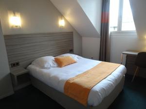 Voodi või voodid majutusasutuse The Originals City, Hôtel Ker Izel, Saint-Brieuc toas
