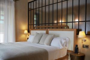 Кровать или кровати в номере Boutique Hotel Mendi Argia