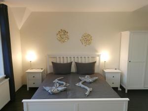 Voodi või voodid majutusasutuse Apartments Villa-Ratskopf Wernigerode toas