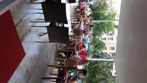 a group of people on a staircase in a building at Altunakar 1 Hotel in Didim +40 photos
