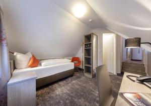 Postel nebo postele na pokoji v ubytování Hotel Alte Bäckerei + 22 fotografií