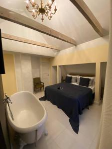Postel nebo postele na pokoji v ubytování Villa Kertelhof Guesthouse