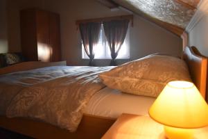 Posteľ alebo postele v izbe v ubytovaní House Burić