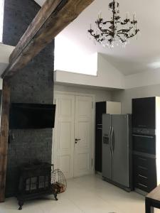Kuchyň nebo kuchyňský kout v ubytování Villa Kertelhof Guesthouse