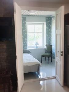 Postel nebo postele na pokoji v ubytování Villa Kertelhof Guesthouse