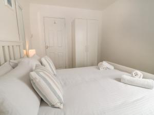 
A bed or beds in a room at 113 Babbacombe Road

