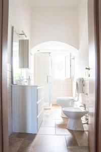 Kúpeľňa v ubytovaní Villa Bruna + 11 fotografií