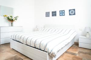 Posteľ alebo postele v izbe v ubytovaní Villa Bruna