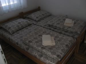 Giường trong phòng chung tại Apartman Jana Apatin