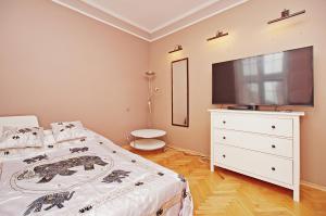 TV a/nebo společenská místnost v ubytování BaySide Apartments MainCity