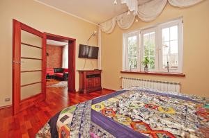 TV a/nebo společenská místnost v ubytování BaySide Apartments MainCity