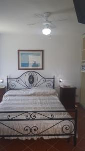 Postel nebo postele na pokoji v ubytování Villa Rosa