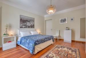 Łóżko lub łóżka w pokoju w obiekcie Hotel Villa De Santis