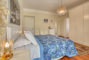 Łóżko lub łóżka w pokoju w obiekcie Hotel Villa De Santis
