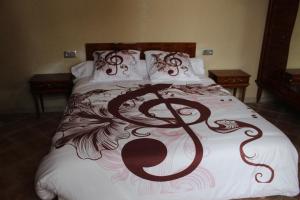 Ένα ή περισσότερα κρεβάτια σε δωμάτιο στο Domaine de la Touche