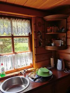 Kuchyň nebo kuchyňský kout v ubytování Agroturystyka w ogrodach