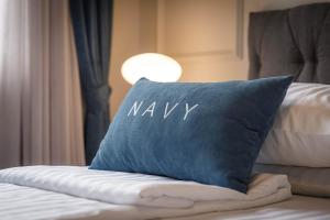 Postel nebo postele na pokoji v ubytování Apartments Olivia & Navy, Šilo
