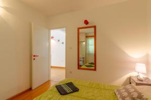 Postel nebo postele na pokoji v ubytování Apartment Nanica Prigradica