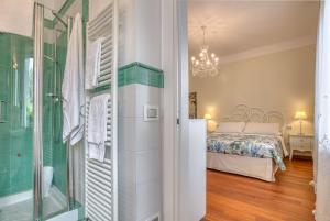 Łóżko lub łóżka w pokoju w obiekcie Hotel Villa De Santis