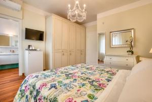 Łóżko lub łóżka w pokoju w obiekcie Hotel Villa De Santis