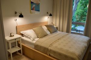 Postel nebo postele na pokoji v ubytování Apartamenty Park