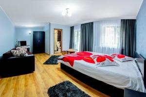 Un pat sau paturi într-o cameră la Vila Nico
