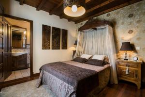 Postel nebo postele na pokoji v ubytování Casa da Muiñeira + 37 fotografií