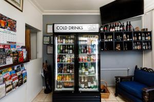 a refrigerator filled with lots of drinks in a store at Bendigo Oval Motel in Bendigo
